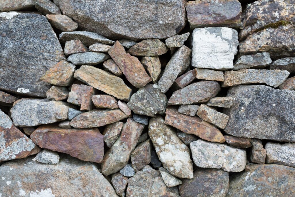 Dry-stacked wall built from stones of many different sizes and shapes